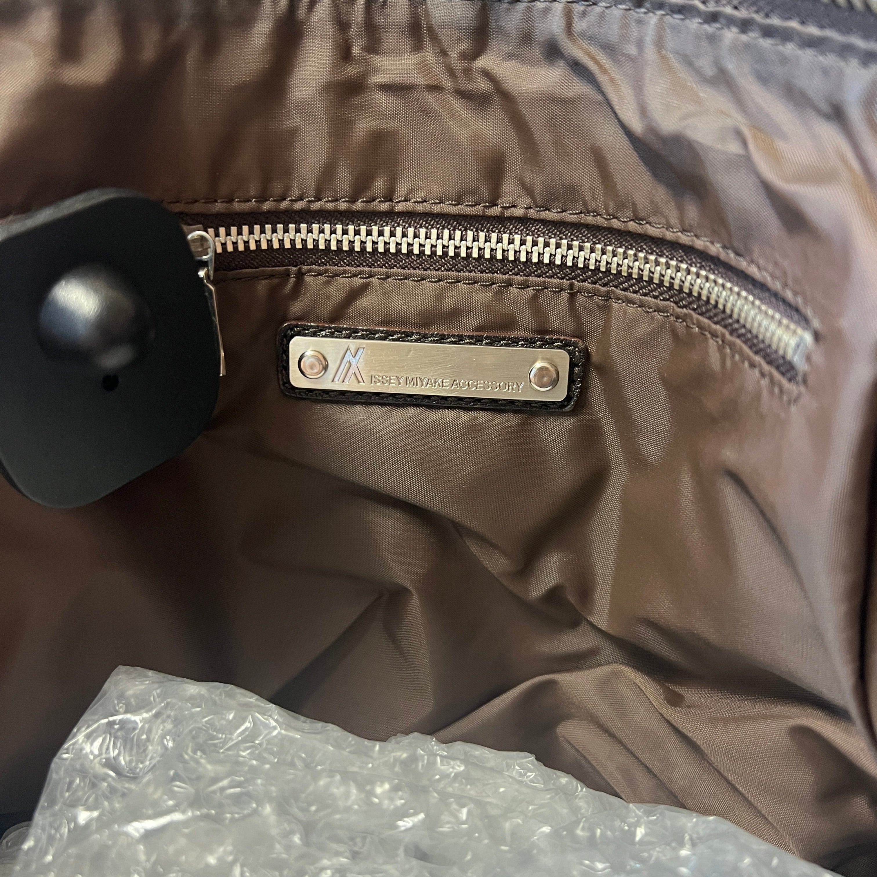 ISSEY MIYAKE leather handbag