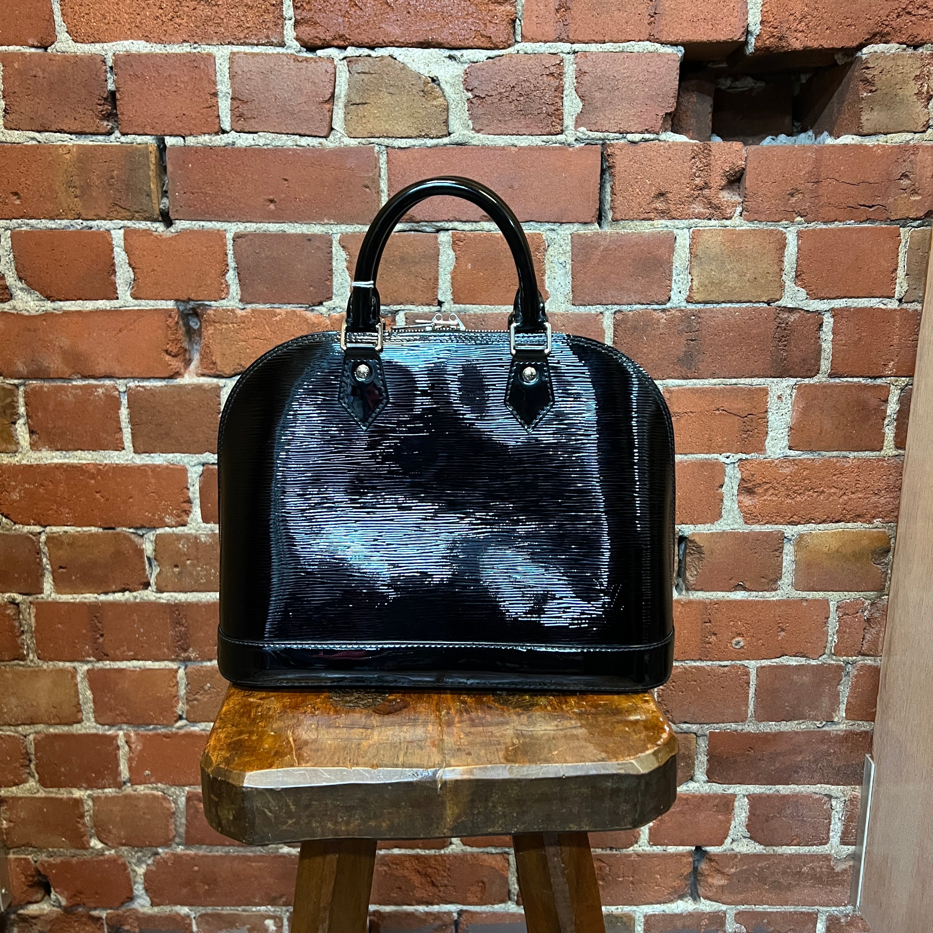 Alma patent leather handbag