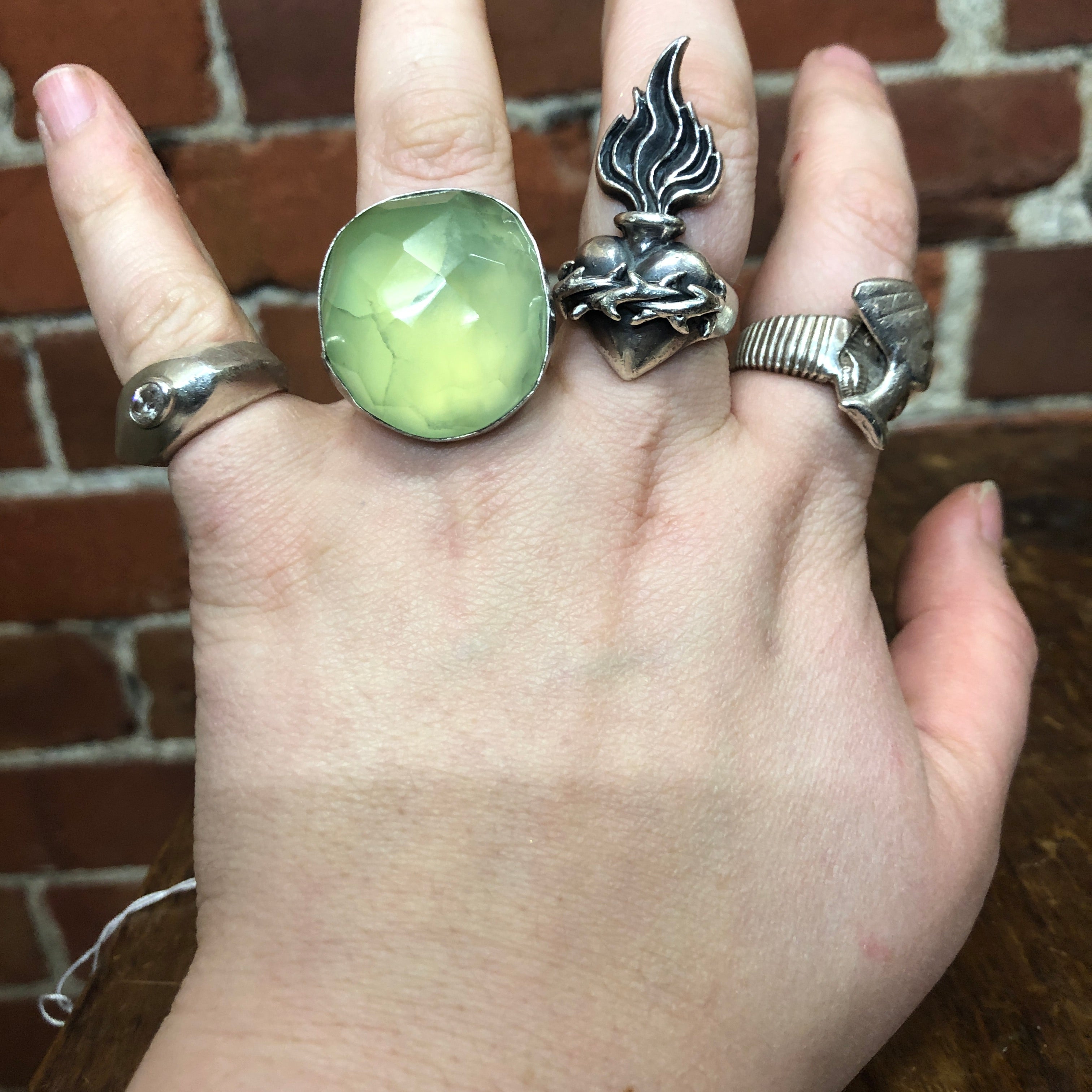 STG SILVER AND green stone ring