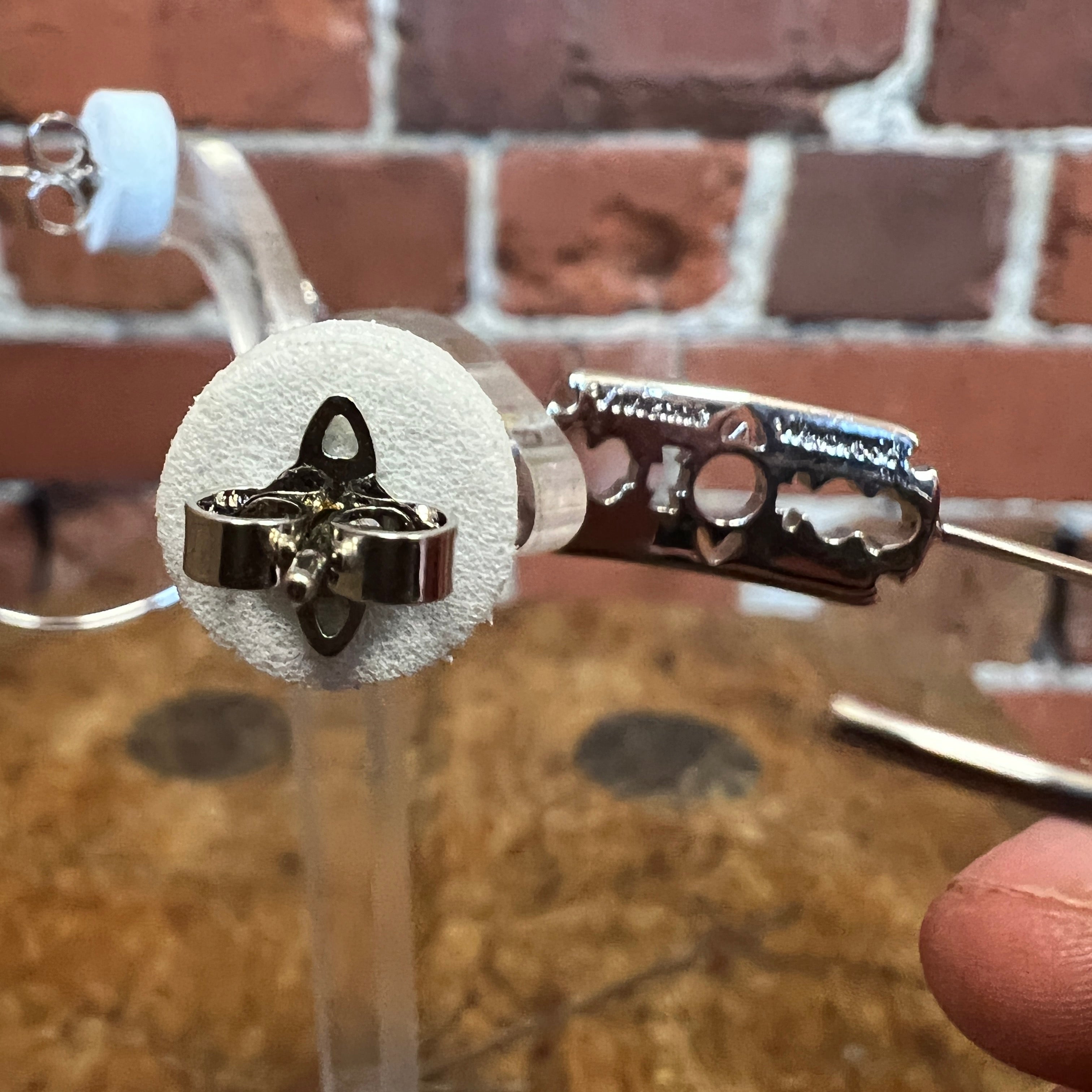 Vivienne westwood razor earrings Clearance