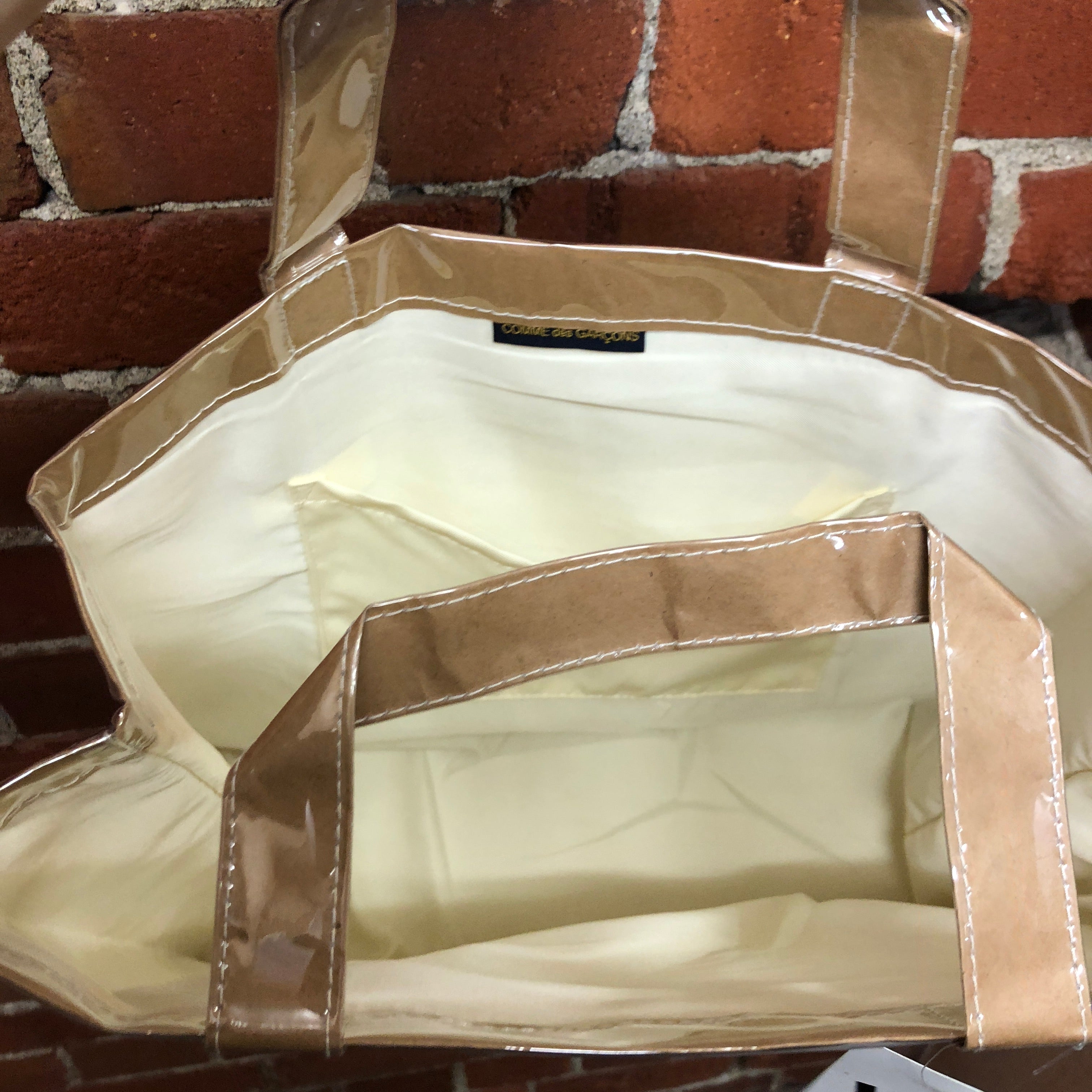 COMME DES GARCONS PVC covered paper handbag