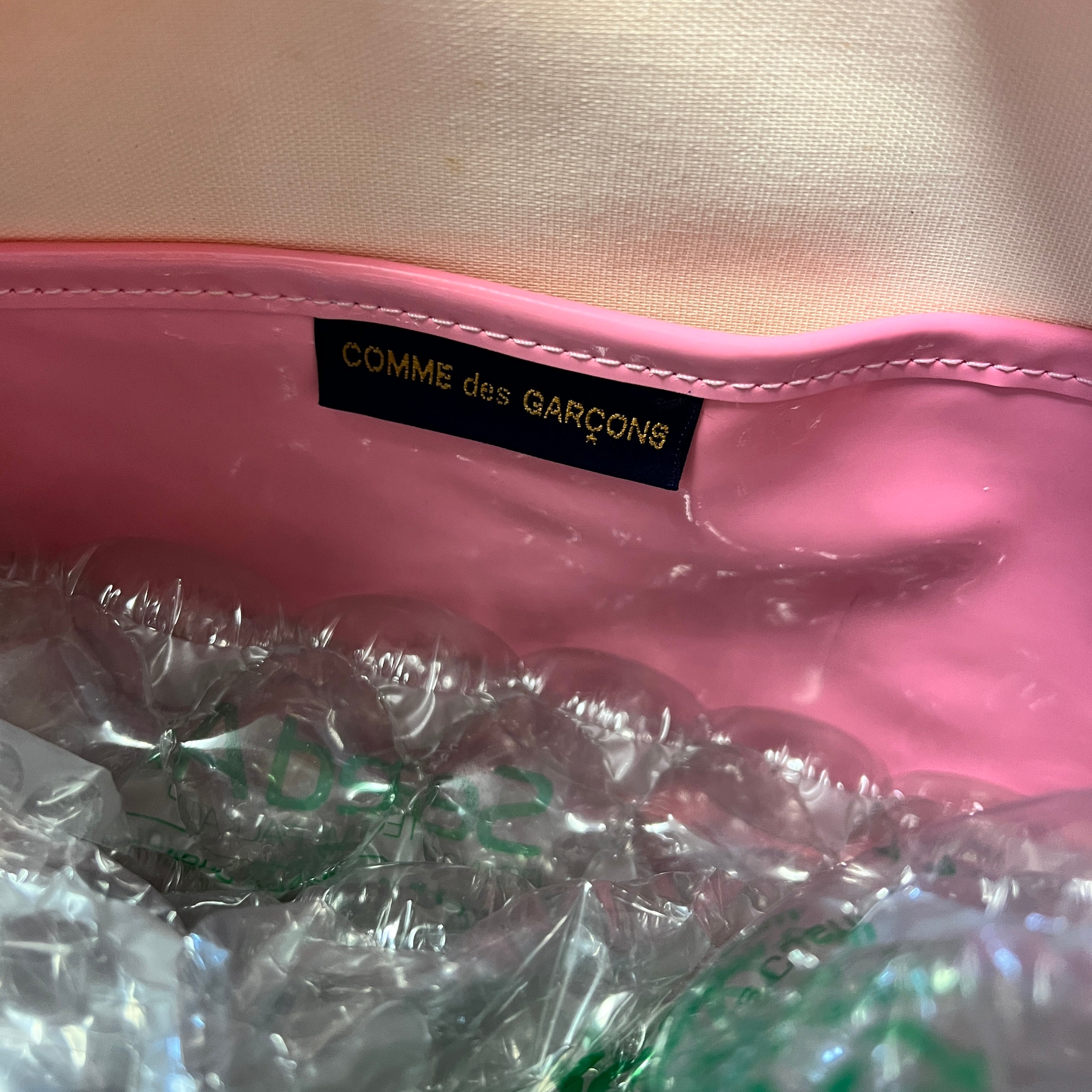 COMME DES GARCONS patent pink handbag