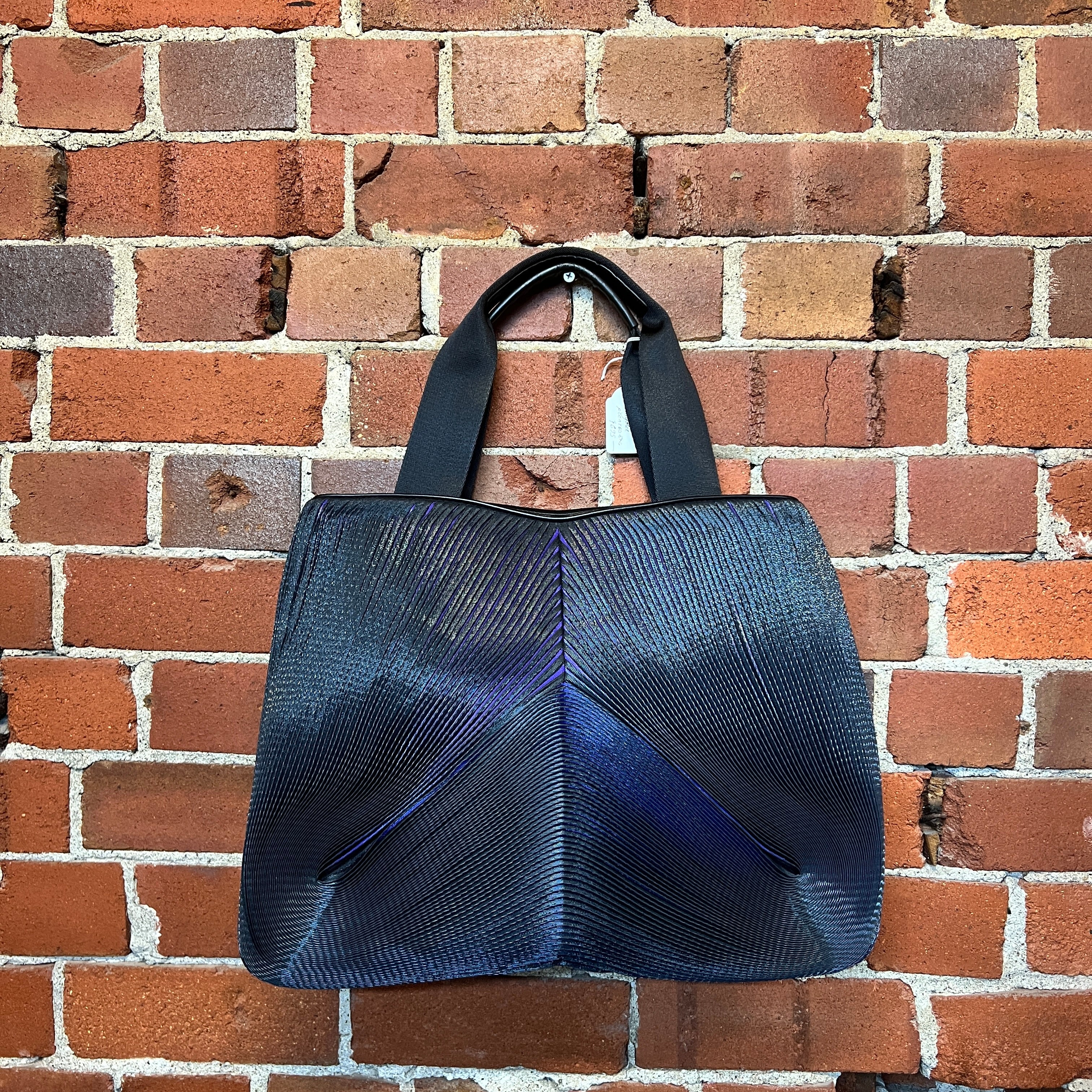 ISSEY MIYAKE pleated handbag