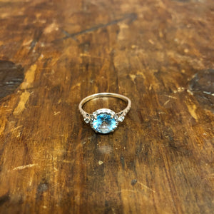 Sterling silver and blue topaz ring