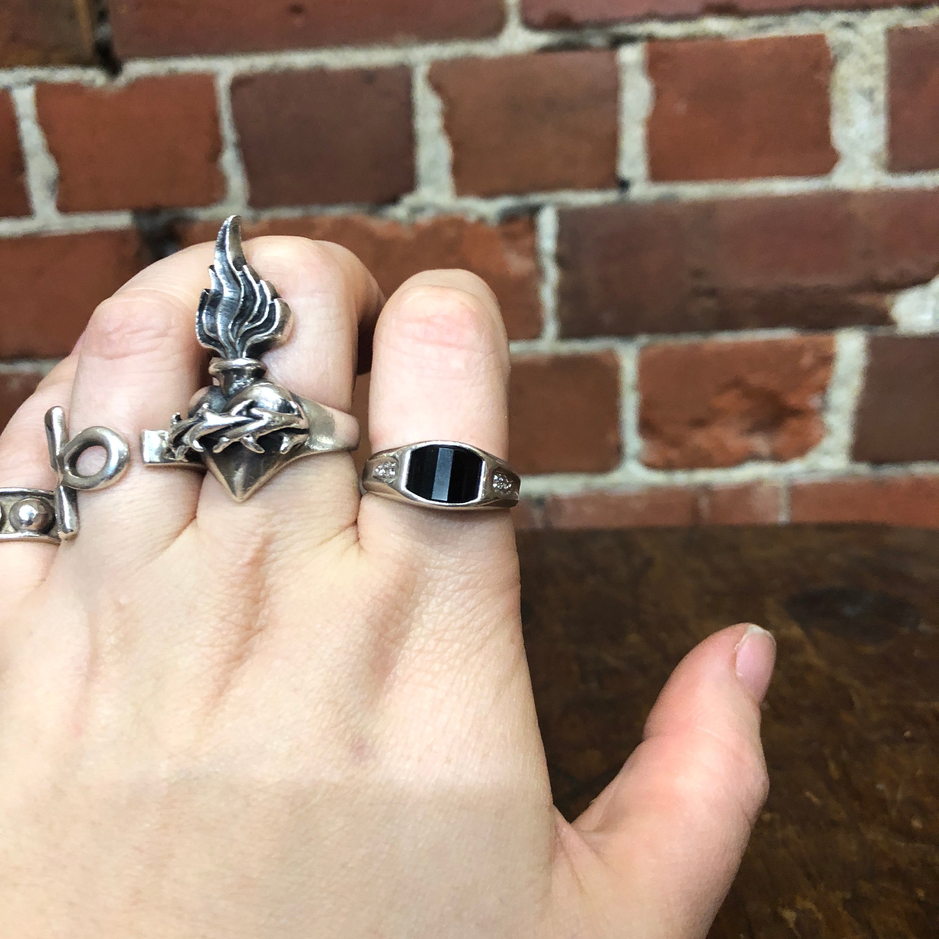 Sterling silver, onyx and diamond ring
