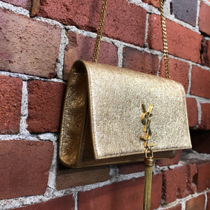 YVES SAINT LAURENT gold handbag