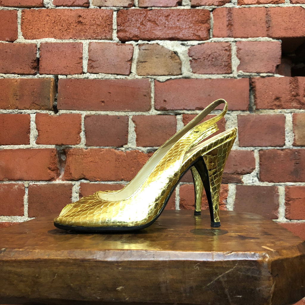 PRADA gold snakeskin slingback heels