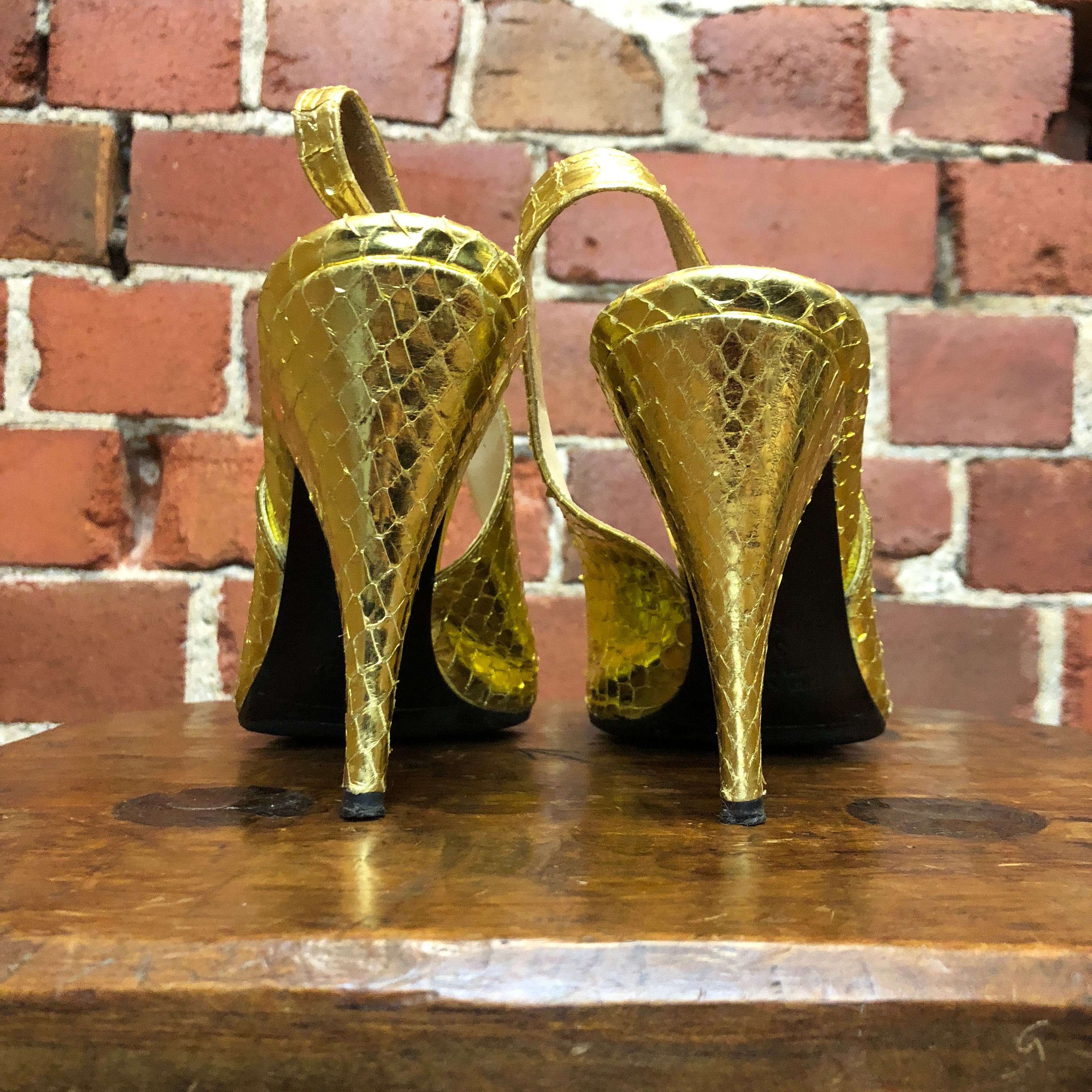 PRADA gold snakeskin slingback heels