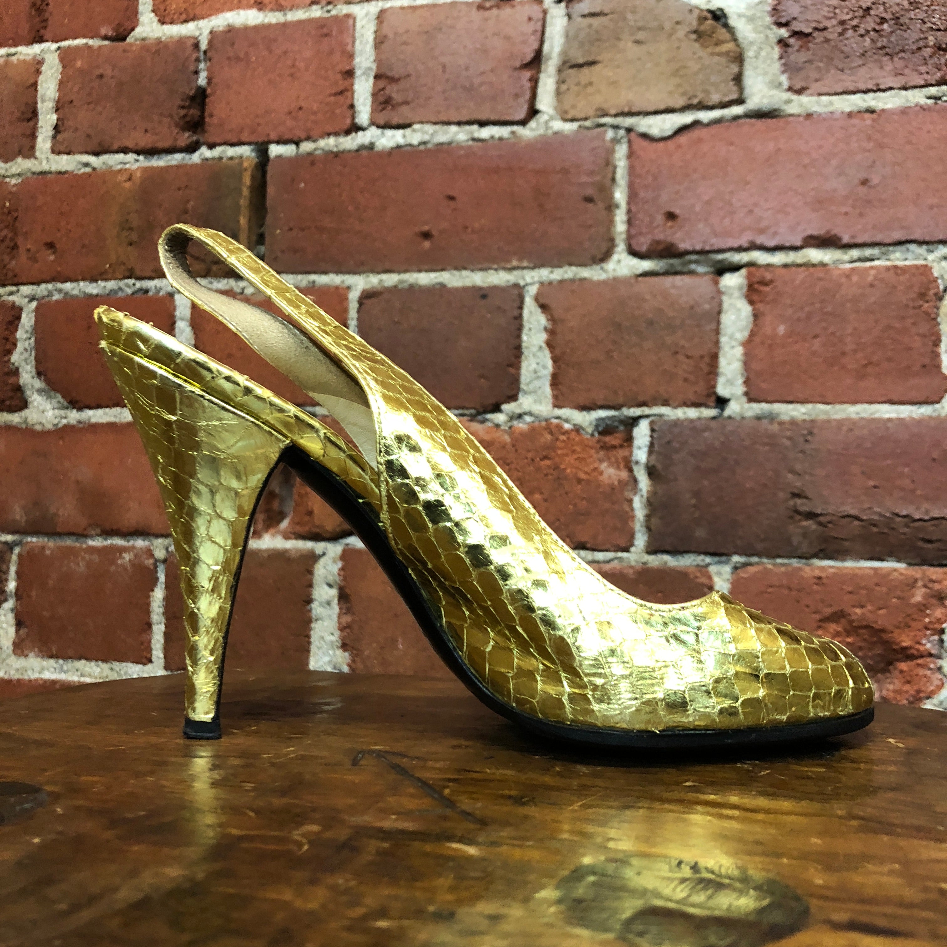PRADA gold snakeskin slingback heels