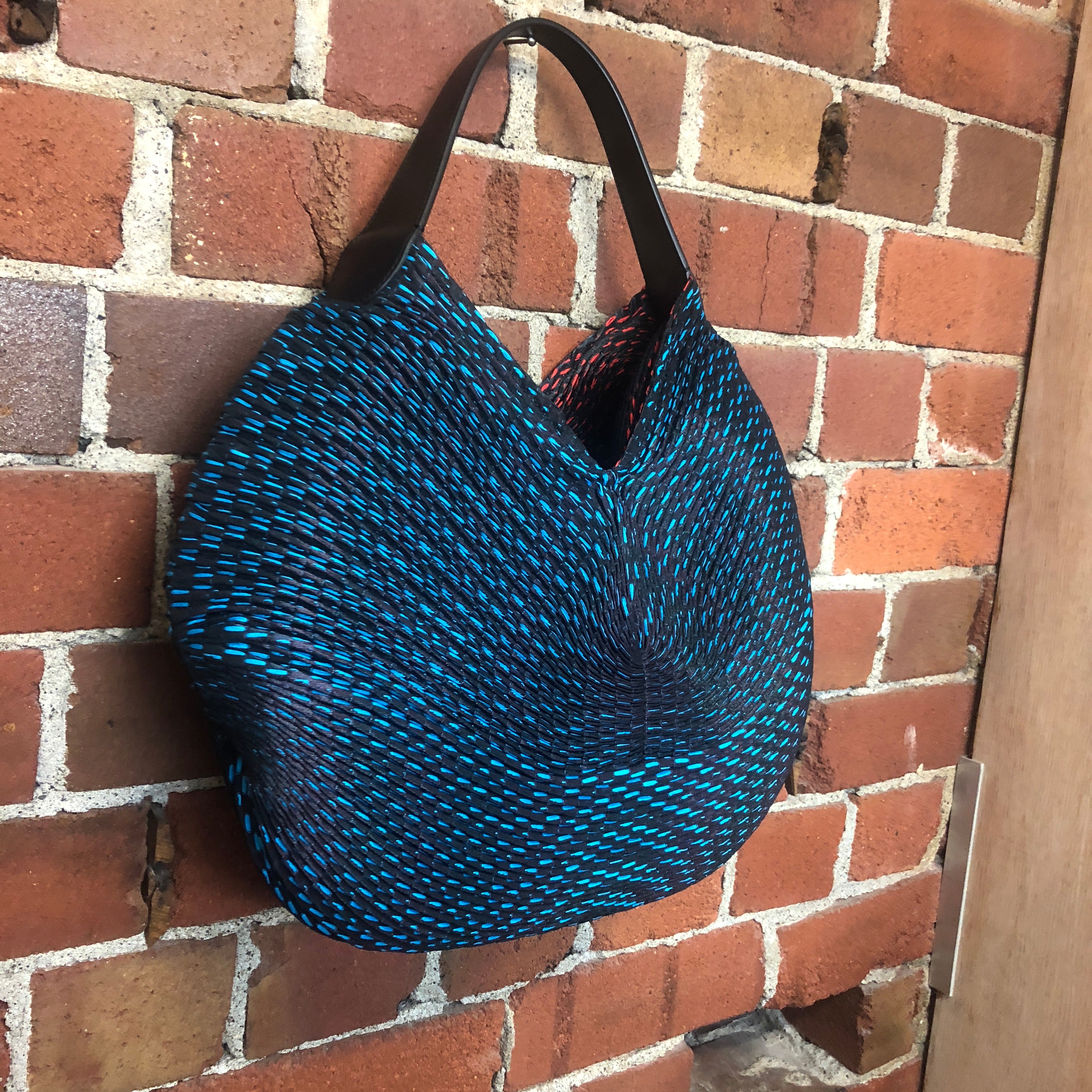 ISSEY MIYAKE new pleated nylon handbag