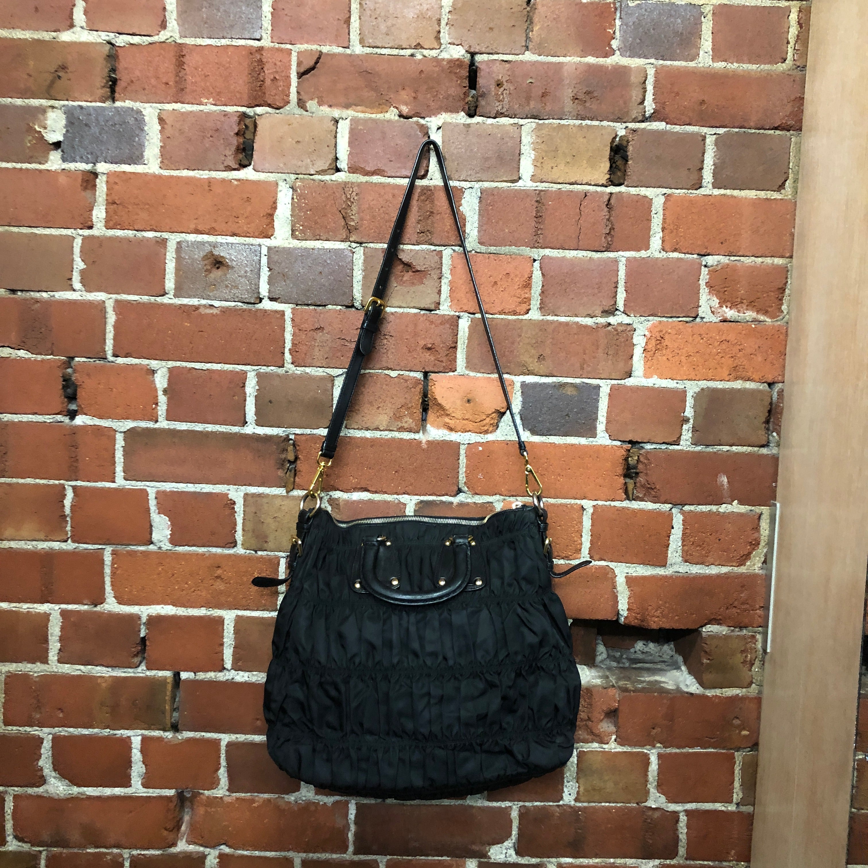 PRADA ruched nylon and leather handbag