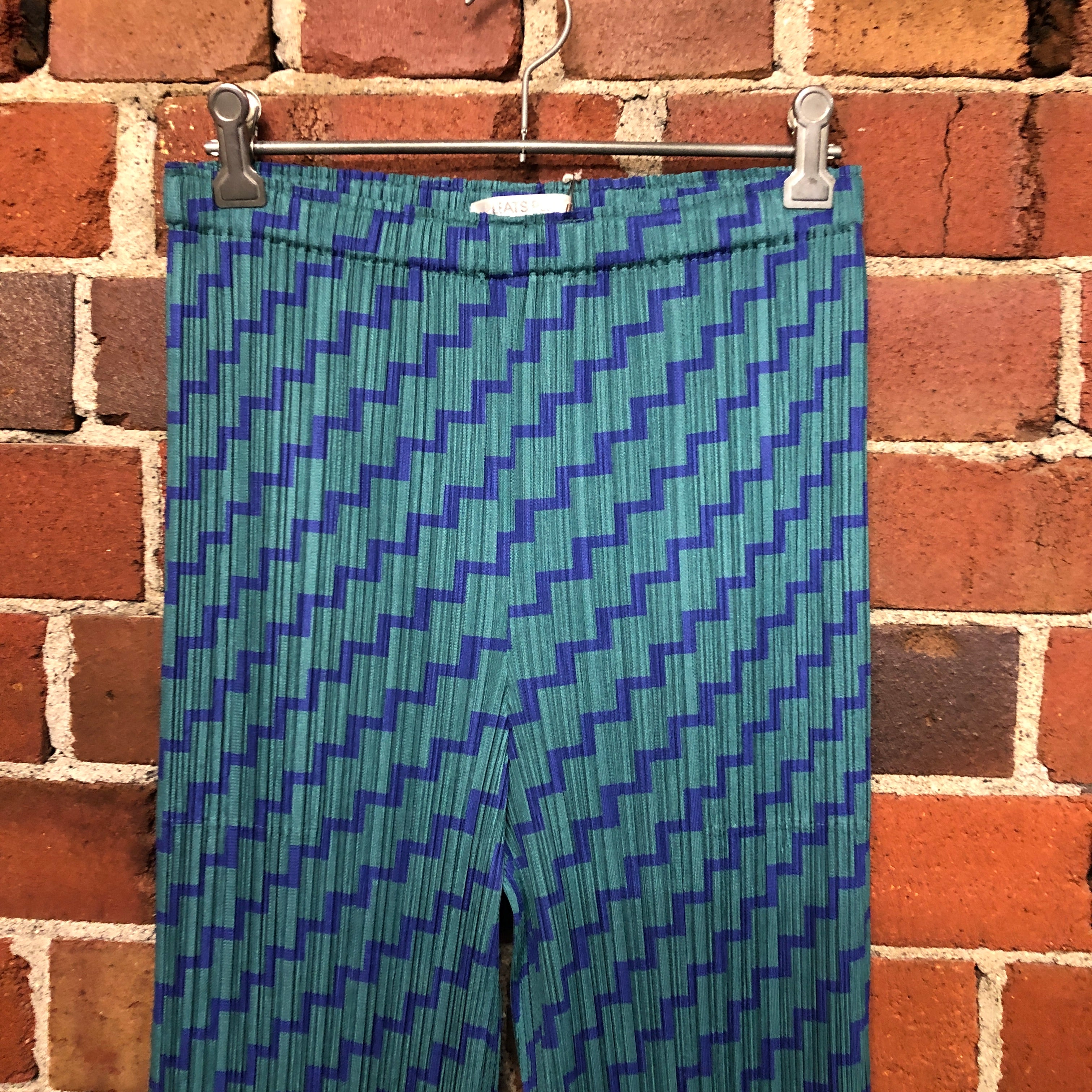 PLEATS PLEASE zig-zag print pants