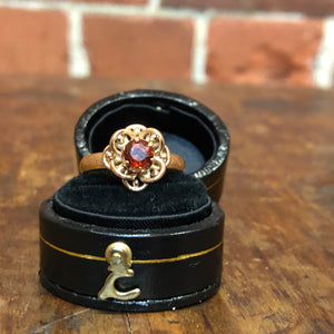 9ct gold and garnet flower ring