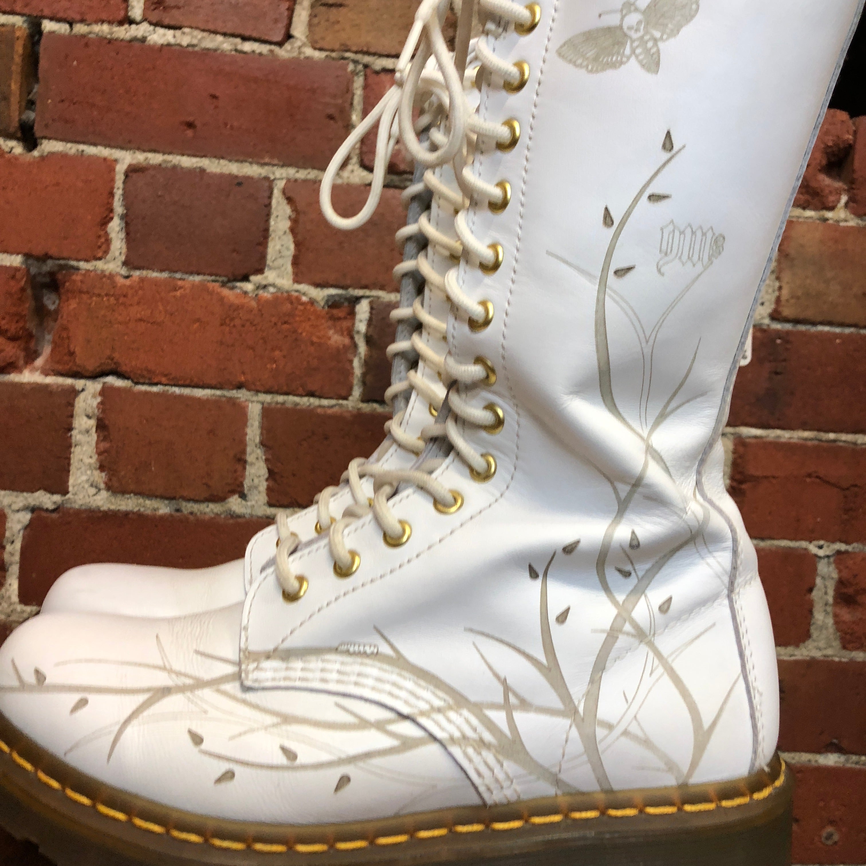 12 up white leather Doc Martens