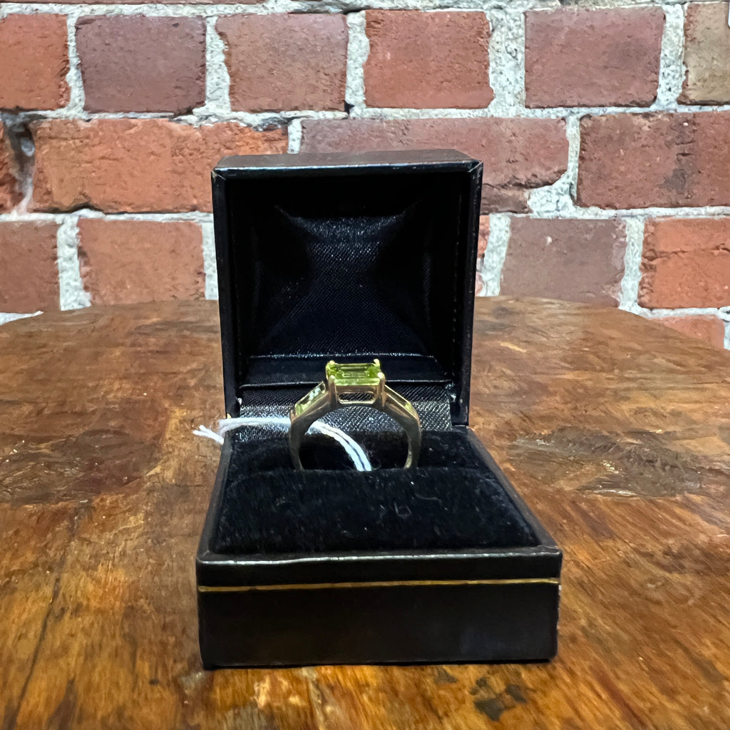 10k gold and emerald cut peridot ring