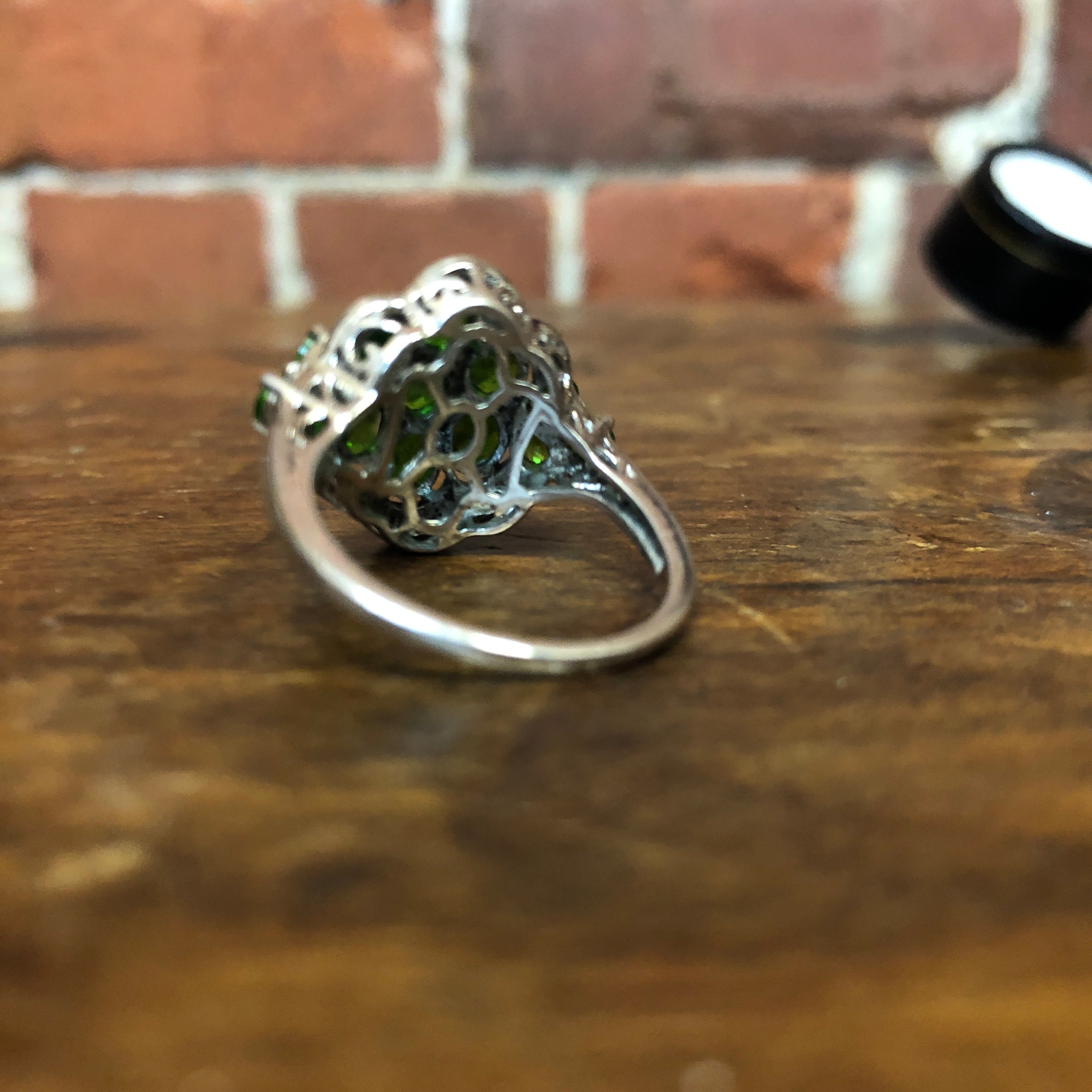 Platinum plated sterling silver peridot ring